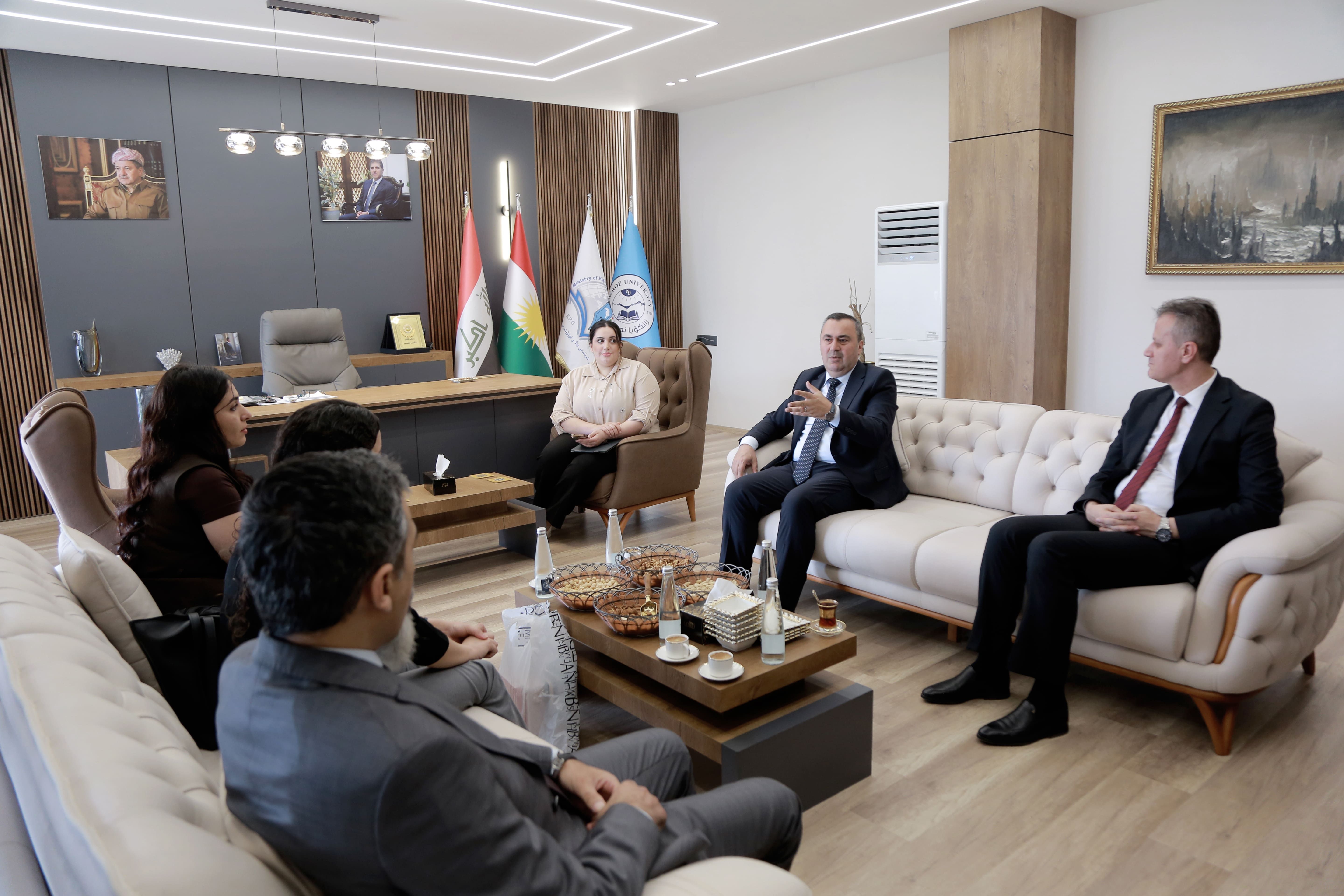 President of Nawroz University Receives a High-Level Delegation from the Kurdish Language Foundation in Western Kurdistan