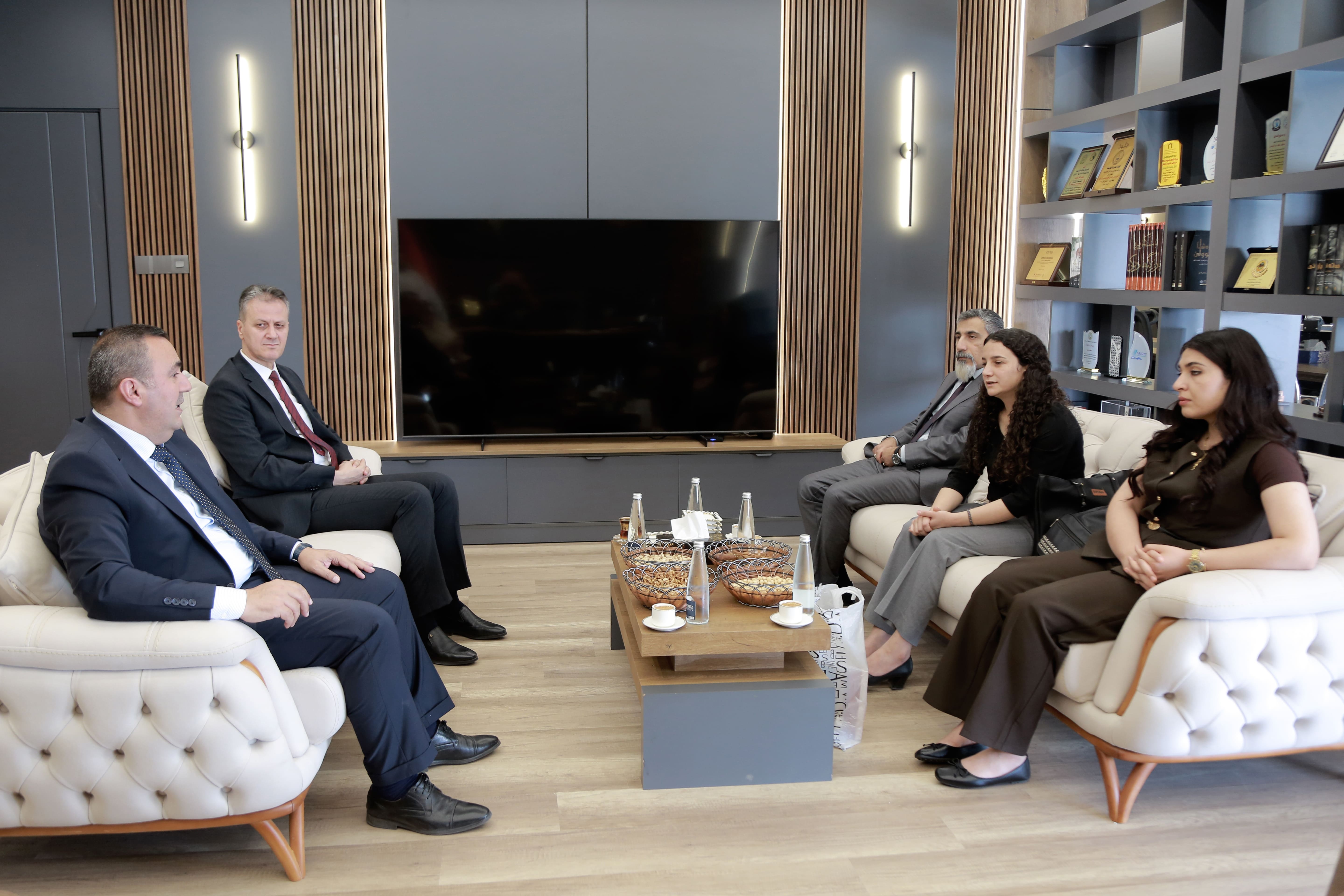 President of Nawroz University Receives a High-Level Delegation from the Kurdish Language Foundation in Western Kurdistan