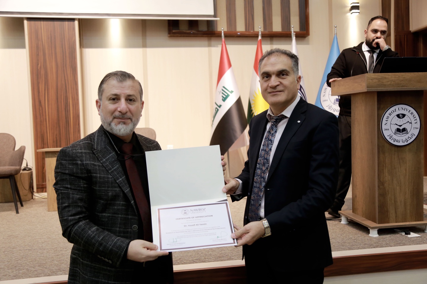 Nawroz University Holds Symposium on International Day of Older Persons