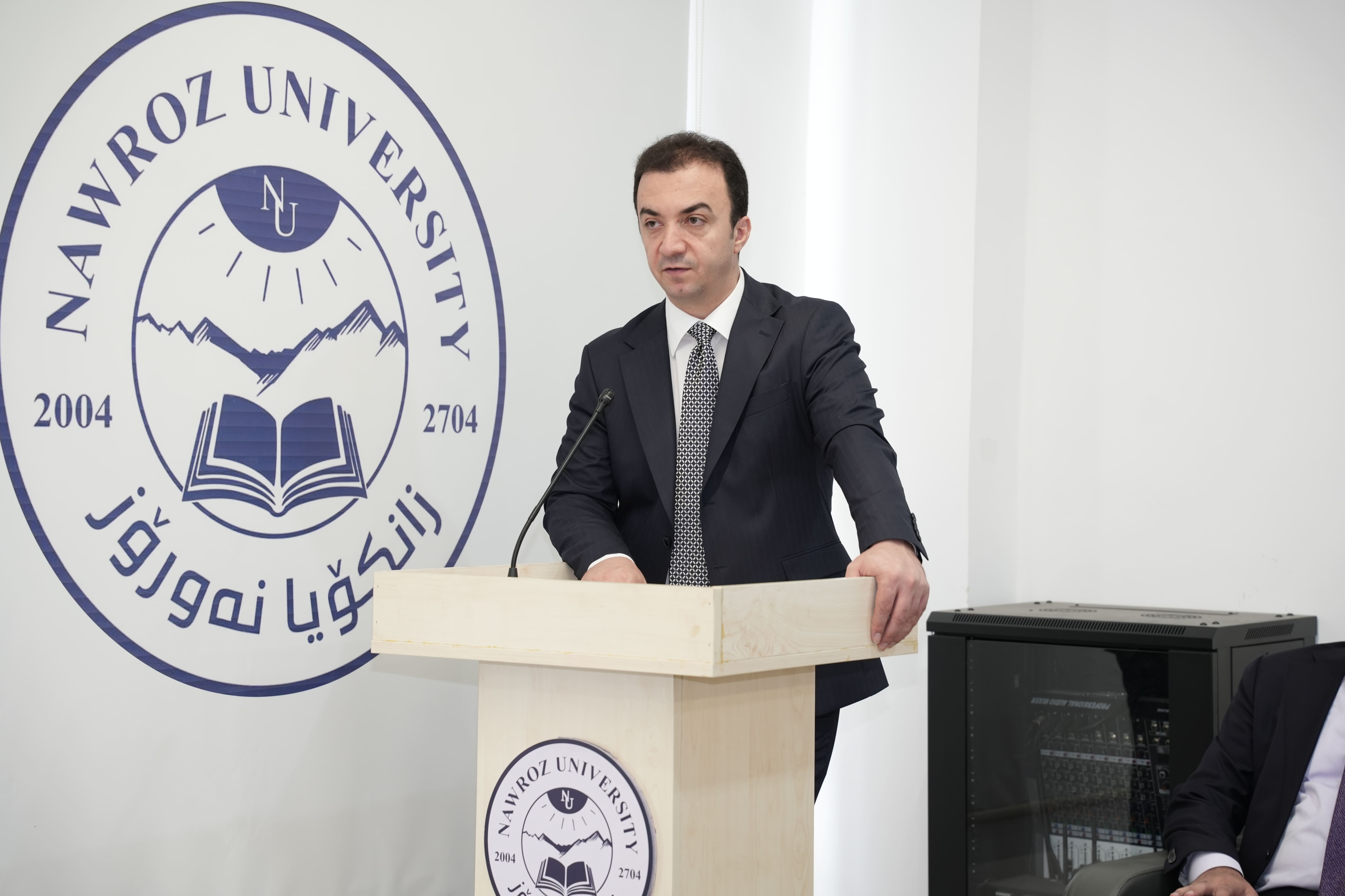 A seminar at Nawroz University on "Procedures for the Professional Code of Conduct for University Faculty and Student Behavior."