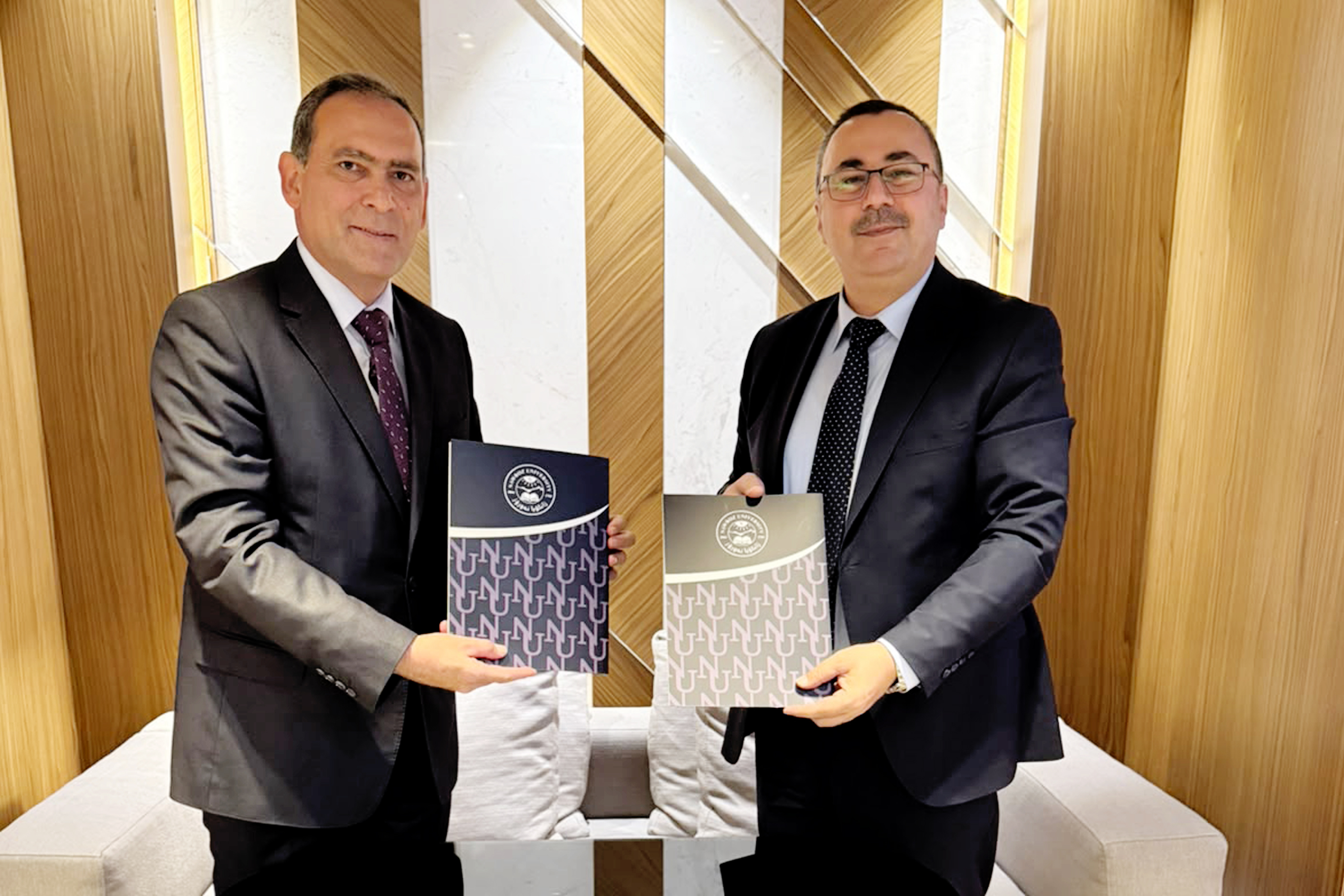 Nawroz University President Signs Two MoUs with International Universities in North Macedonia